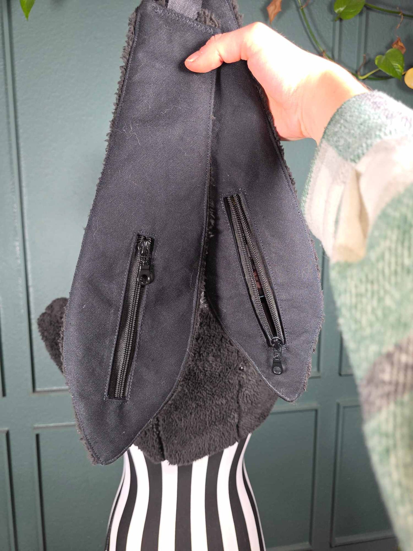 1.1 Bunny hood, hidden ear pockets, black