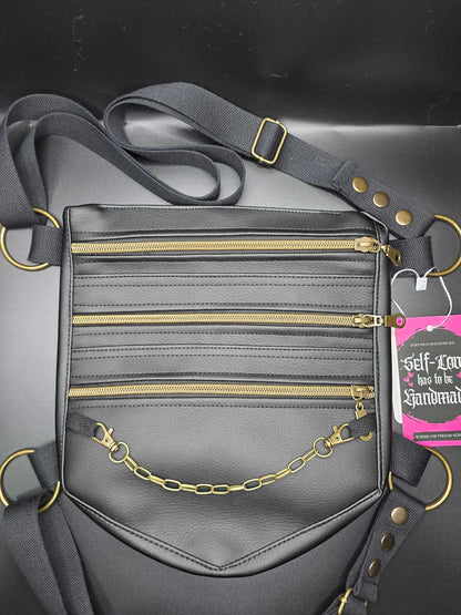 LB3.1 Leg Bag, black faux leather, bronze