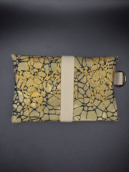 TT13.1 Tabacco pouch, tribals gold