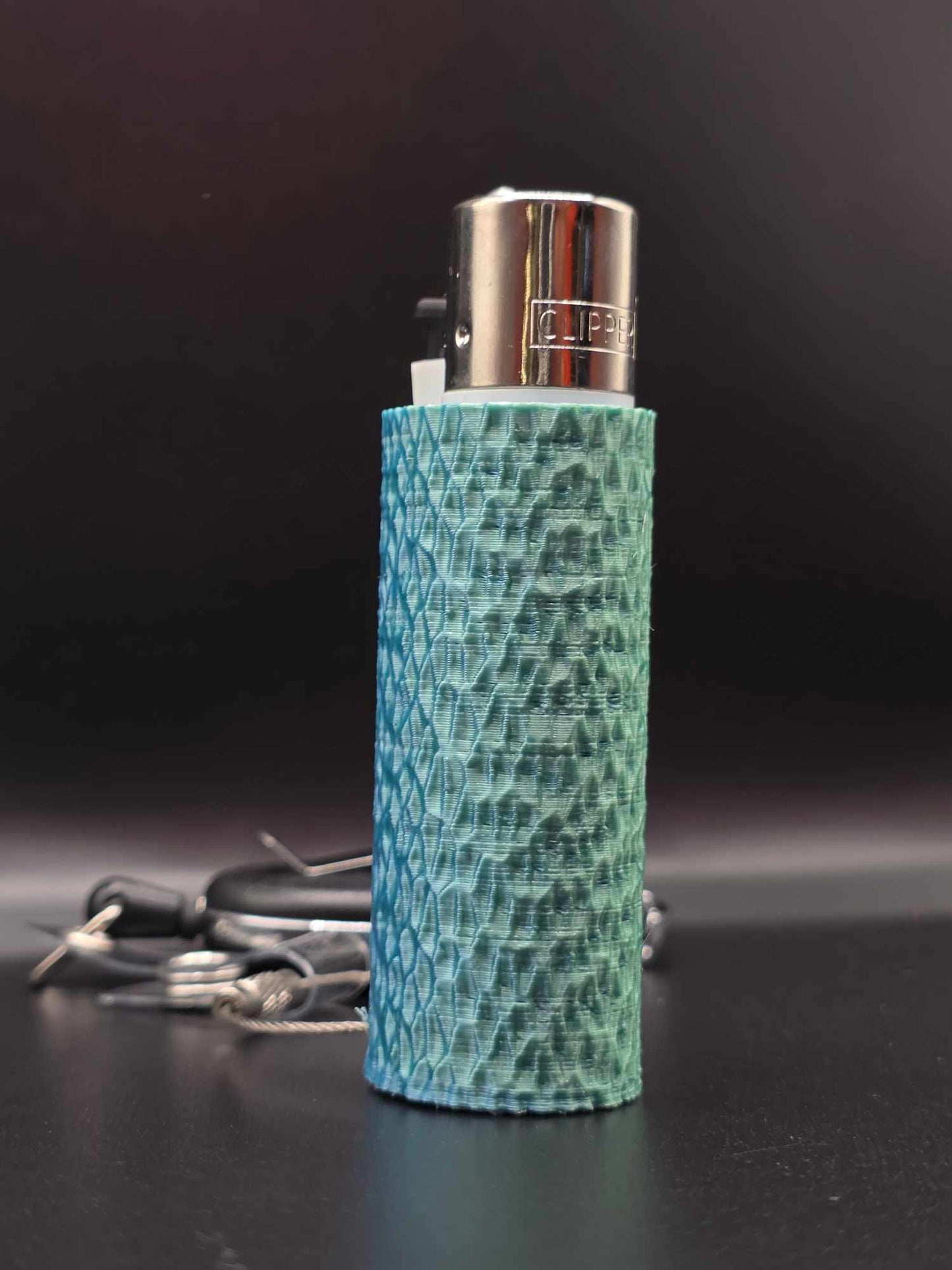 Trippy 3D Feuerzeug, ripples, hell blau-grün