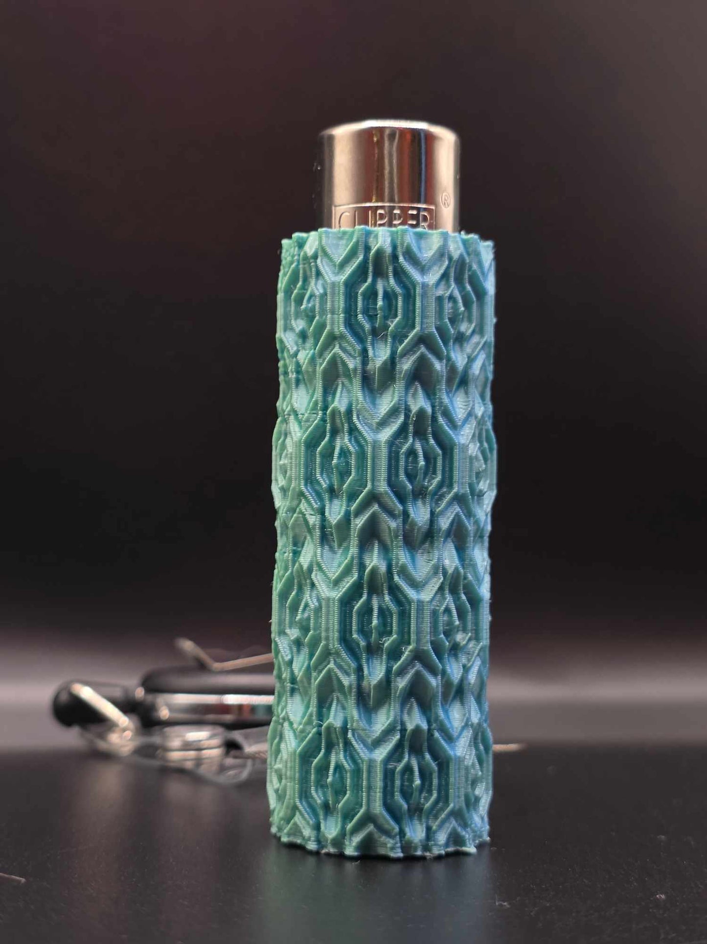 Trippy 3D Feuerzeug, hell blau-grün