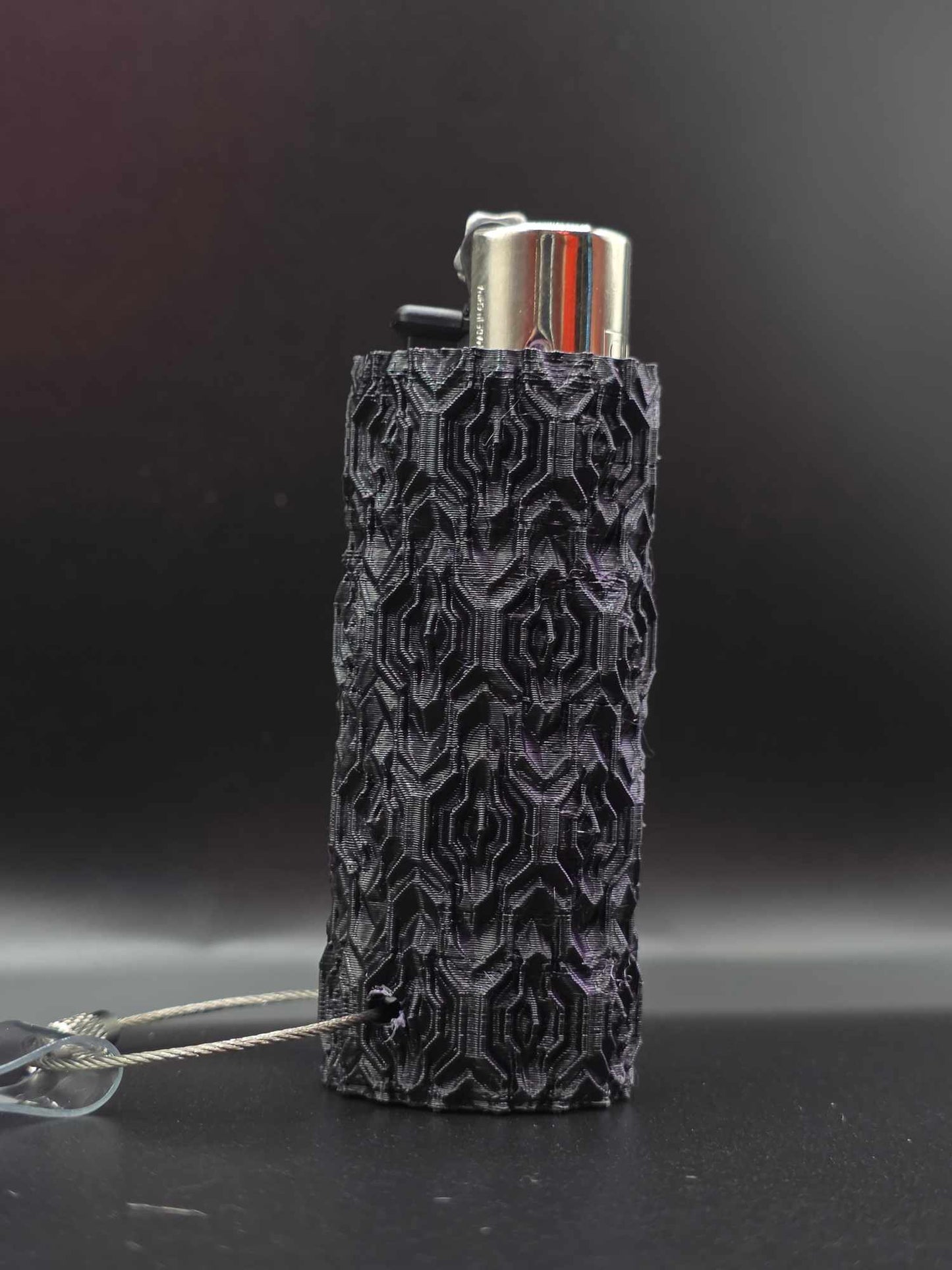 Trippy 3D Feuerzeug, schwarz-lila