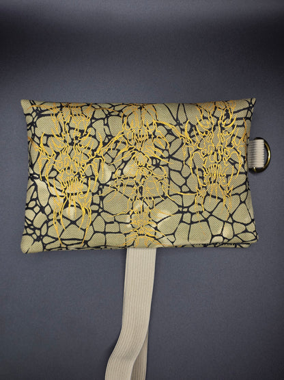 TT13.1 Tabacco pouch, tribals gold